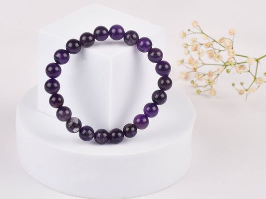 Amethyst crystal stone symbolising spiritual healing and calmness.