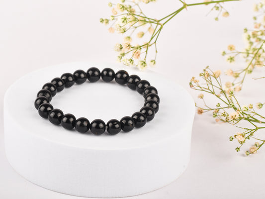 Black Tourmaline crystal for protection, grounding, and energy purification.