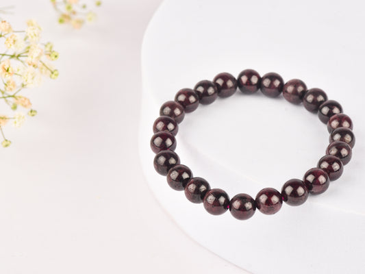 Garnet stone for stimulating love, creativity, and vitality.