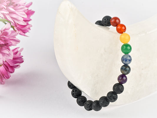Lava stone with chakra beads for chakra alignment and healing.