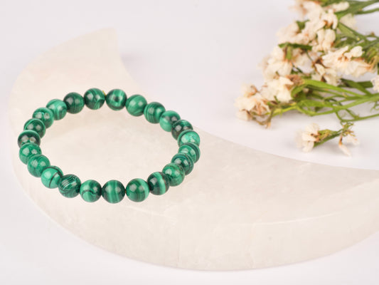 Malachite gemstone for transformation, emotional healing, and inner peace.