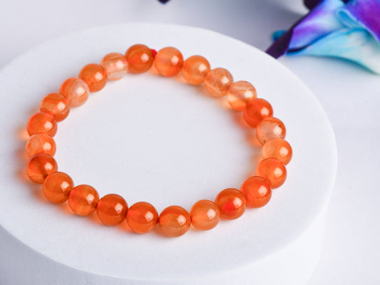 Carnelian crystal promoting vitality, passion, and grounding energy.