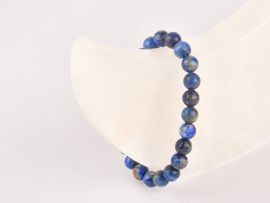 Lapis Lazuli crystal for spiritual growth and self-awareness.